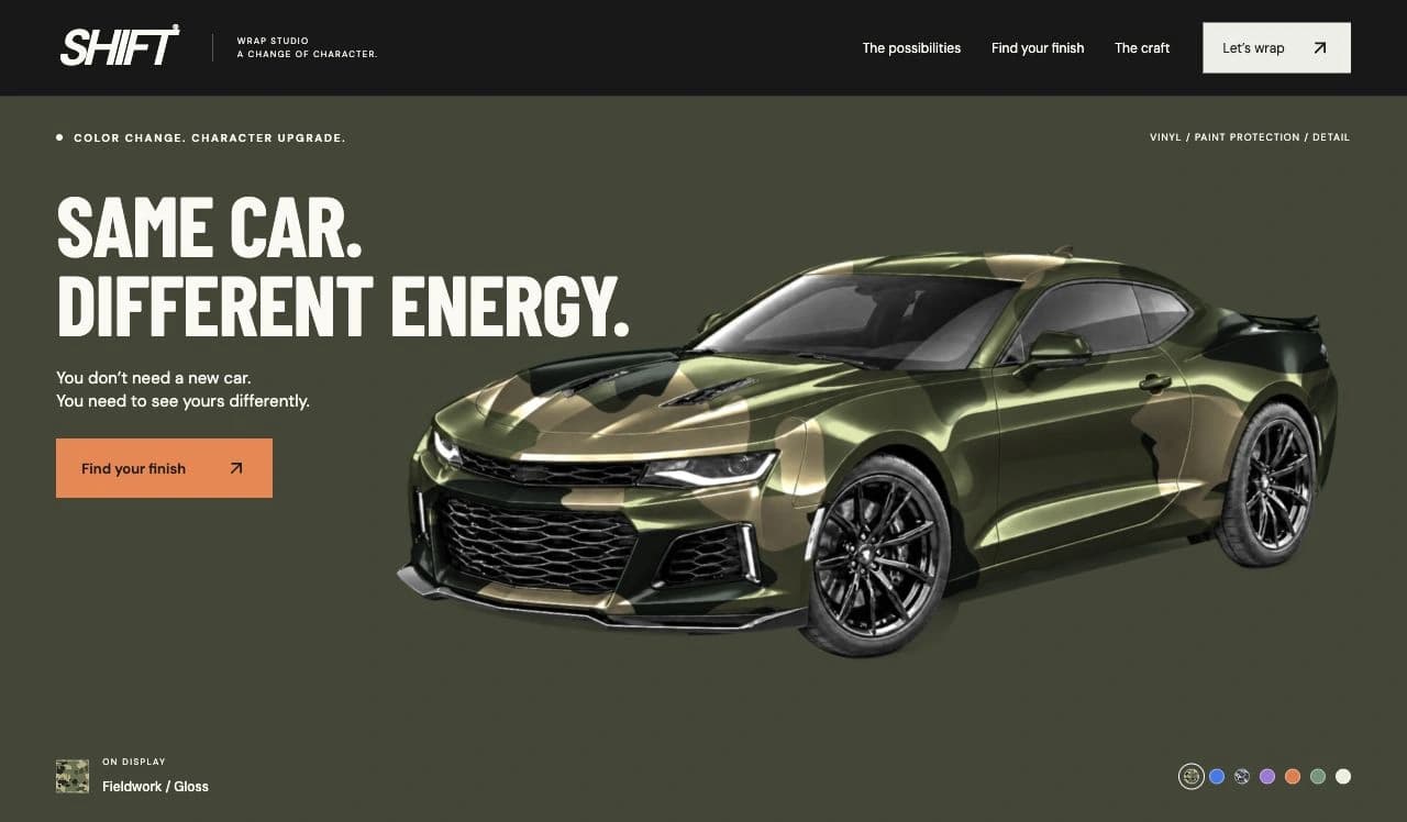 SHIFT Wrap Studio website with an olive and sand camouflage Camaro, oversized white headline and wrap color controls