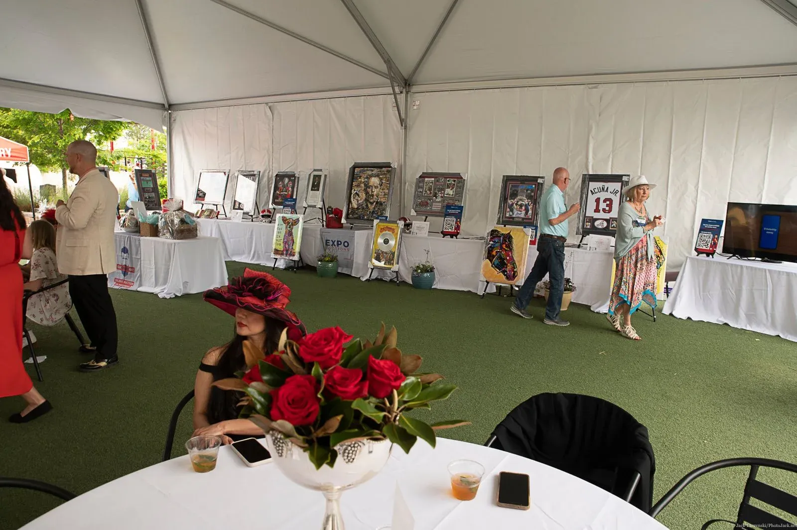 Artwork displayed inside an event tent