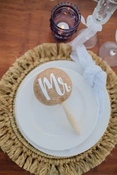 Decorated place setting with a fringed charger